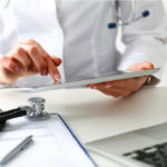 Image of a doctor going through content on an iPad
